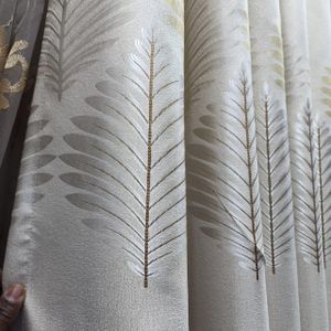 Gold and cream Curtains with a matching Heavy sheer with Eyelet Header. 
